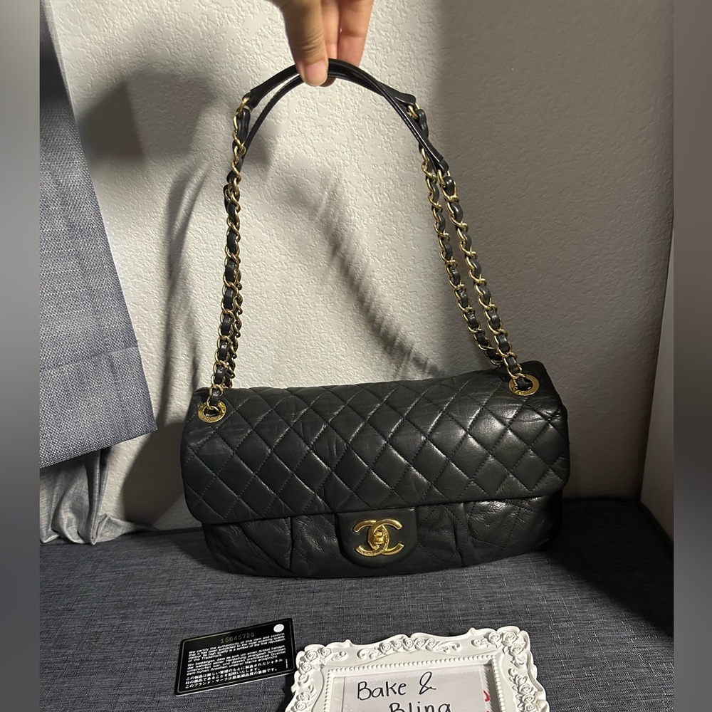 Chanel black quilted iridescent calfskin leather flap chain bag